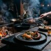 Offene Feuerküche mit Whisky und nordatlantischem Fine-Dining-Gericht beim Scotch & Beef Club „Ember & Sea“ in Fürth